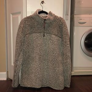 True Grit 1/4 zip. Very comfortable and will keep you warm and stylish.